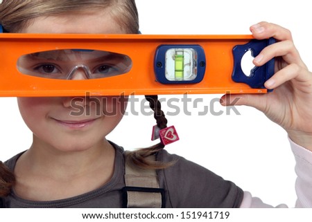 Girl with a spirit level