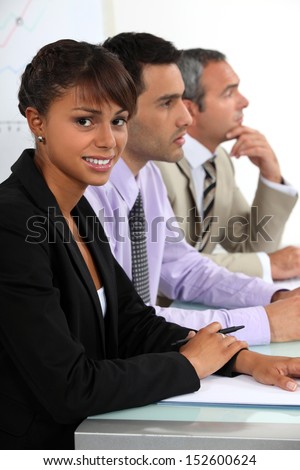Three people sat on interview panel