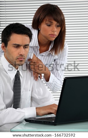 Business couple with strong work ethic