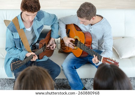 Playing the guitar together