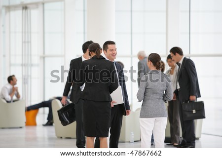 Group of business people attending a meeting