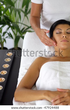 Woman in laying in a massage room