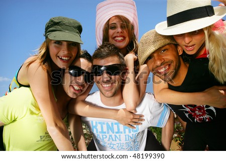 Group of friends having fun in summer