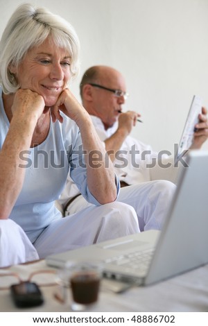 Senior woman with laptop computer