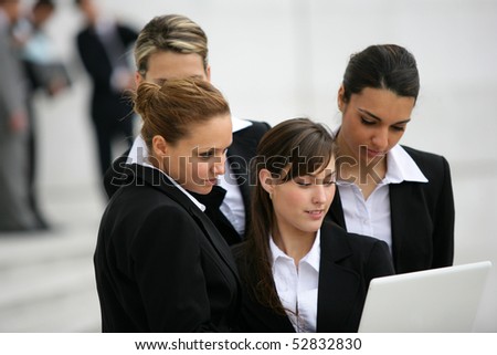 Portrait of women in front of a laptop computer