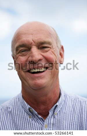 Portrait of a senior man laughing