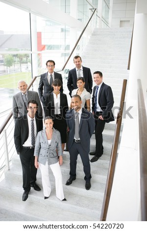 Group of business people smiling standing on stairs