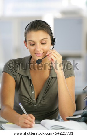 Portrait of a young woman with a headset