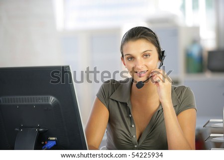 Portrait of a young woman with a headset