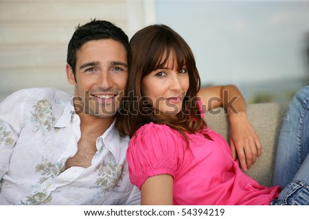 Portrait of a young couple back to back