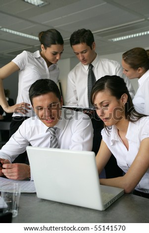 Young business people meeting with laptop computer and documents
