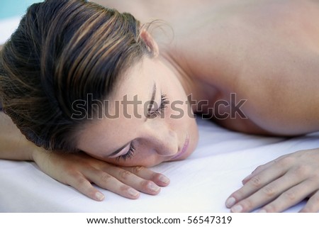 Laid woman with eyes closed