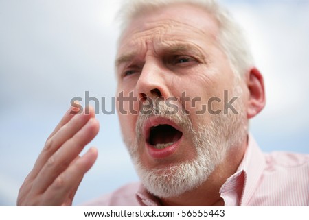 Portrait of a senior man ready to sneeze