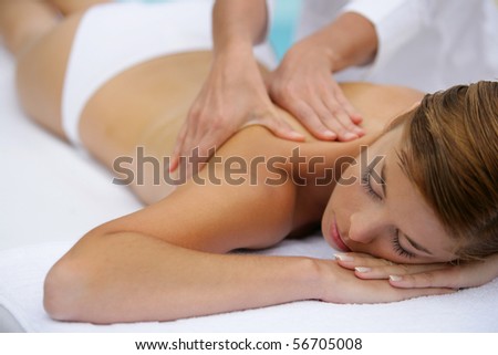 Young woman being massaged