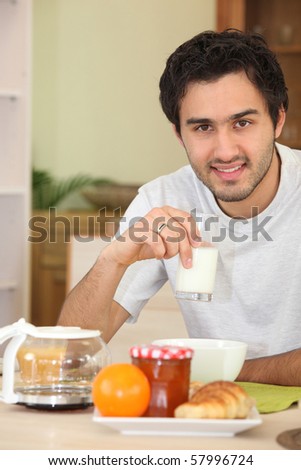 Portrait of a man at breakfast