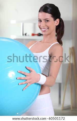 Young woman in sports room