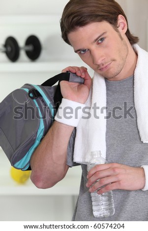 Young man with sports bag