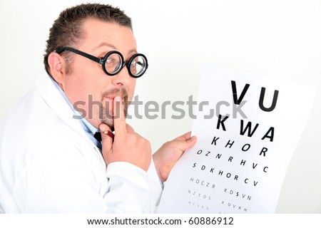 Portrait of a doctor with a visual acuity chart