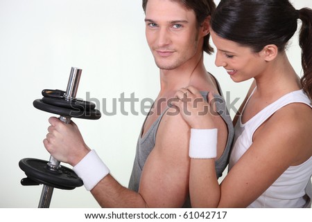 Man and woman doing sports