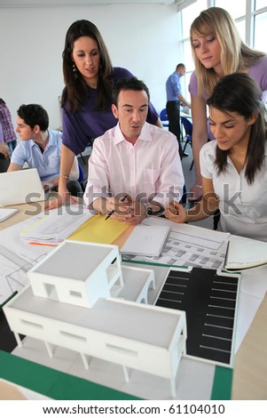 Professor and students in architecture