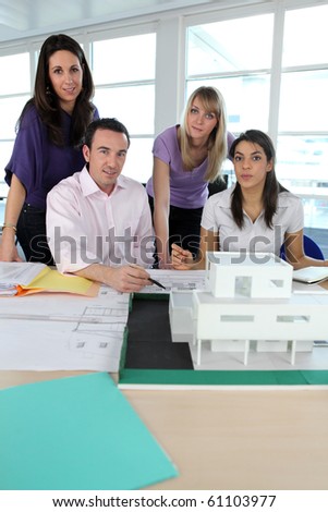 Teacher and students in architecture