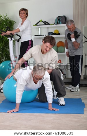 Group of senior people with a sports trainer