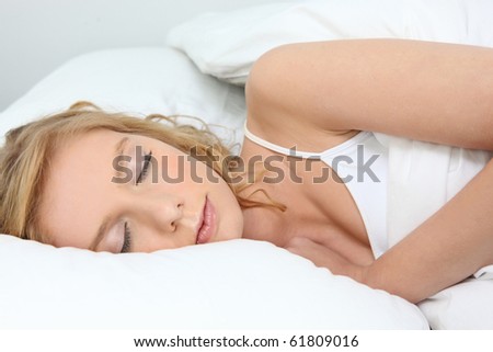 Young fair-haired woman asleep