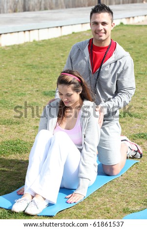 Sports coach and young woman