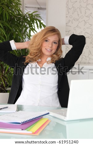Portrait of a businesswoman relaxed in office