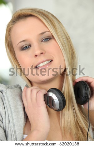 Portrait of a young woman with headphones
