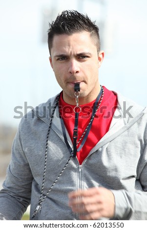 Man with a coach\'s whistle