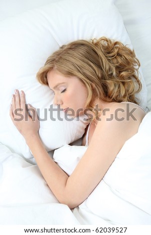 Young fair-haired woman asleep