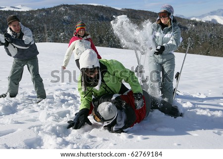 Snowball fight between friends