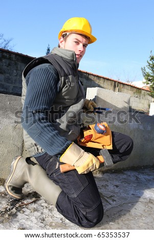 Young worker with helmet