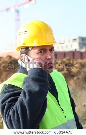 Portrait of a worker on mobile phone