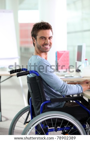 Young man smiling in wheelchair