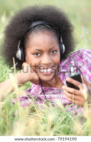 Woman listening to music outside