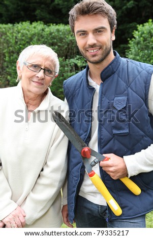 young man and older woman in garden