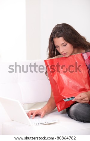 Woman purchasing products on-line