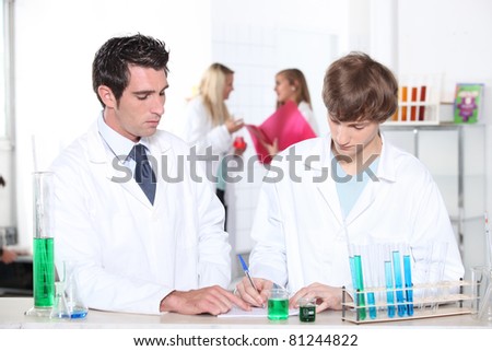 Chemistry teacher and student