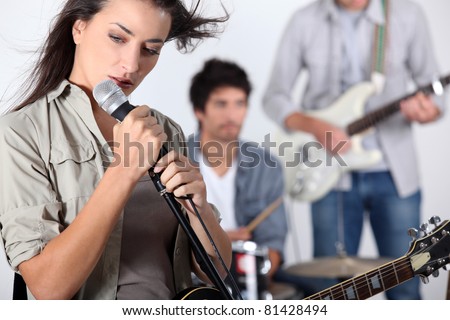 Woman playing in a band
