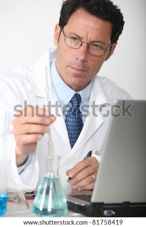 Lab technician analyzing test results