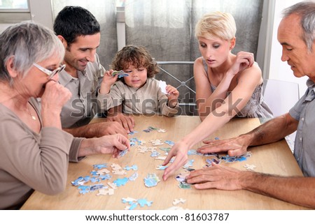 a family making a puzzle