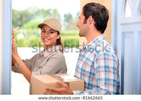 man receiving package from a delivery girl