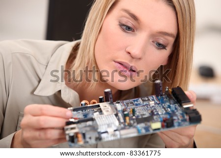 woman repairing pc