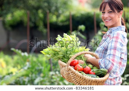 Woman in her vegetable garden