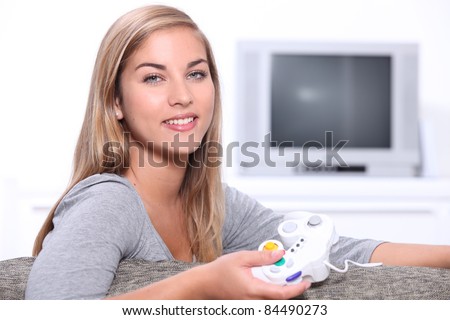 Young woman on games console
