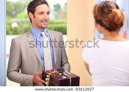 Boyfriend delivering girlfriend present