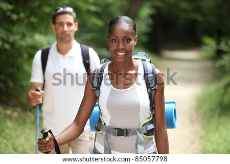 Couple hiking through the countryside