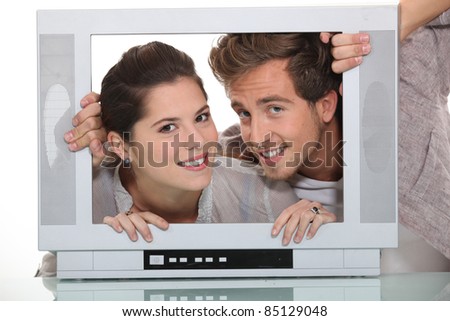 Couple in a television screen